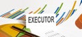 EXECUTOR text on paper on chart background with pen