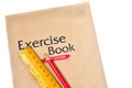 Exercise book with ruler and pencil Royalty Free Stock Photo