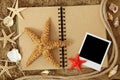Exercise book and sea stars Royalty Free Stock Photo