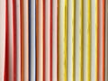 Exercise books stacked different colors horizontal