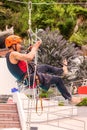 Hispanic Climber Training For Climbing Rope Competition