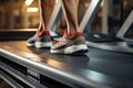 Exercise close up Man briskly walks on a treadmill in the gym Royalty Free Stock Photo