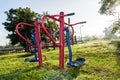 Exercise equipment in public park on sunrise. Royalty Free Stock Photo