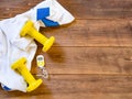 Exercise equipment on wood background