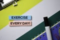 Exercise Every Day text on sticky notes with office desk concept