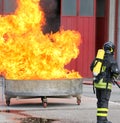 Exercise of Firefighters with a tank full of flames and very hot