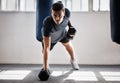 Exercise, fitness and man with dumbbells for push up in gym for workout, training or exercising. Sports, portrait or Royalty Free Stock Photo