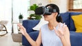 Exercise at home, e sport, Happy asian girl playing vr while workout fitness, Healthy asia woman wearing virtual reality headset Royalty Free Stock Photo