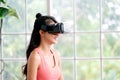 Exercise at home, e sport, Happy asian girl playing vr while workout fitness, Healthy asia woman wearing virtual reality headset Royalty Free Stock Photo