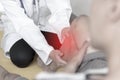 Exercise injury. Doctor help patient who had knee to release pain. Healthcare concept