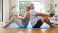 Exercise, living room and happy senior couple stretching together on yoga mat on the floor. Fitness, pilates and elderly Royalty Free Stock Photo