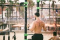 Exercise in the open air in the gymnasium on the beach barceloneta on the shores of the Mediterranean Sea in Catalonia