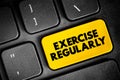 Exercise Regularly text button on keyboard, concept background Royalty Free Stock Photo
