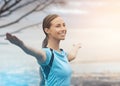 Exercise, smile and stretching with sports woman outdoor in mountains for morning cardio training. Fitness, health and Royalty Free Stock Photo