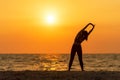 Exercise spirit lifestyle mind woman peace vitality, silhouette outdoors on the Sea sunrise, relax vital abstract.