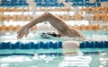 Exercise, sports and a swimmer in a pool during a race, competition or cardio training at a gym. Fitness, water and Royalty Free Stock Photo