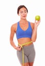 Exercised slim lady dieting on fruits Royalty Free Stock Photo