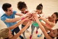 Exercisers group with hands over each other Royalty Free Stock Photo