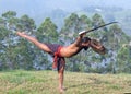 Exercises with sword during Kalaripayattu martial art demonstration