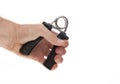 Exercising with a hand gripper.