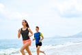 Exercising. Happy Couple Running On Beach. Sports, Fitness. Heal Royalty Free Stock Photo