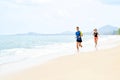 Exercising. Happy Couple Running On Beach. Sports, Fitness. Heal Royalty Free Stock Photo