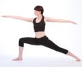 Exercising Yoga Warrior Two pose Virabhadrasana