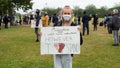 EXETER, DEVON, UK - June 06 2020: A woman holds a sign at a Black Lives Matter demonstration