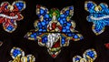 Stained Glass in Exeter Cathedral, West Window Tracery Light, Jesus on the Throne in Heaven Surrounded by Angels Royalty Free Stock Photo