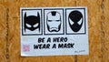 Exeter, UK - July 29 2020: Street art poster promoting wearing a face mask during the Covid-19 pandemic