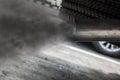 Exhaust from black car , air pollution concept Royalty Free Stock Photo