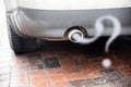 Exhaust from a car with diesel engine emitting gas in the shape