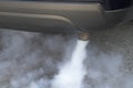 Exhaust fumes from car exhaust pipe Royalty Free Stock Photo