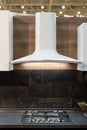 Exhaust hood over induction ceramic cooking stove