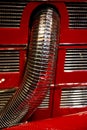 Exhaust hose from old red car