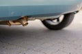 Exhaust from an older car with diesel engine can blow out gas with high particulate matter pollution and is banned from driving in