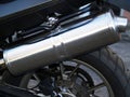 Exhaust pipe as part of racing motorbike Royalty Free Stock Photo