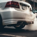 The exhaust pipe of the automobile that emits carbon dioxide as a source of air pollution. Generative AI