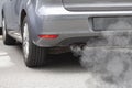 Exhaust pipe of a car blowing out the pollution from the back of a car Royalty Free Stock Photo