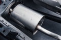 Exhaust pipe muffler under the car Royalty Free Stock Photo