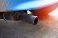 Exhaust pipe on old car close up Car pollution concept