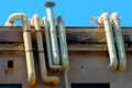 Exhaust pipes of the heating fumes of an ancient building in the historic center of Palermo in Italy