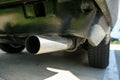 the exhaust tailpipe of the old classic veteran car