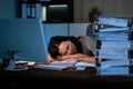 Exhausted Accountant Sleeping In Office