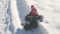 Exhausted baby whine on snow background