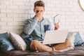 Exhausted business man feeling stressed after working at home Royalty Free Stock Photo