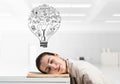 Exhausted business woman sleeping on desk