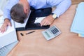 Exhausted businessman sleeping on the desk Royalty Free Stock Photo