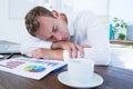 Exhausted businessman sleeping on the desk Royalty Free Stock Photo