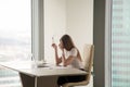 Exhausted businesswoman sitting at office